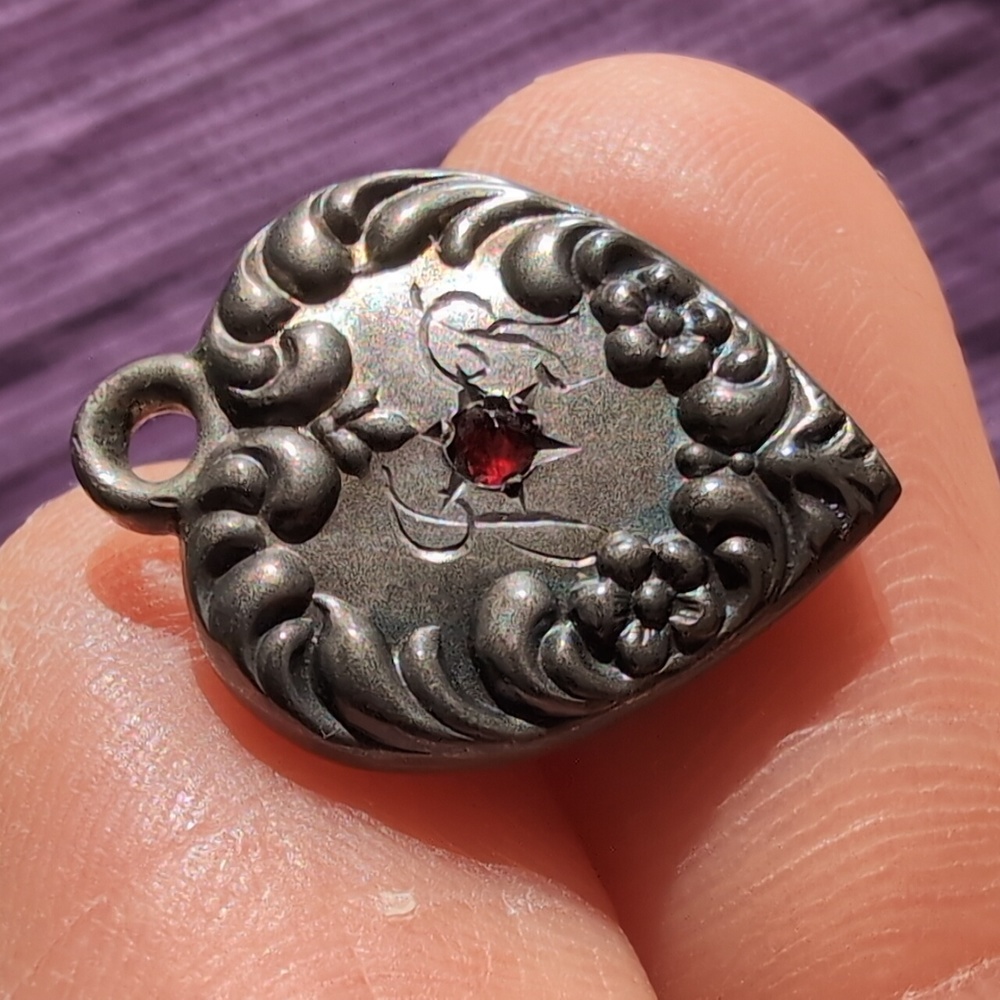 Antique sterling silver puffed heart charm